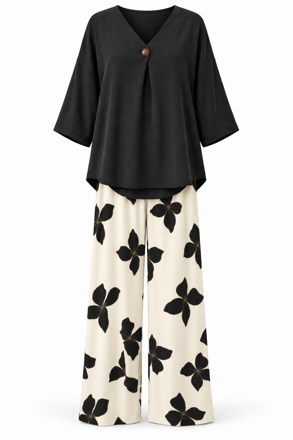 Conjunto de blusa y pantalón de flores negro — frontal