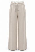 Pantalón de pernera ancha beige con cintura blanca, vista frontal