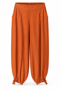 Pantalón con nudos en los bajos — Teja — frontal